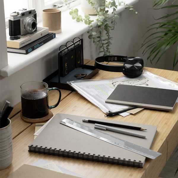 Home office stationary bundle with notebooks, pen and ruler.